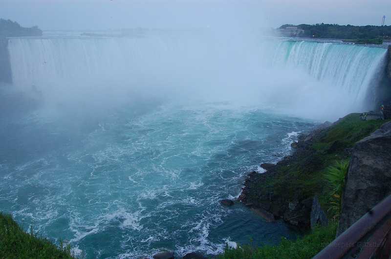 Canada East Tour 2006141.JPG - Impressive.  We understand that only about 1/3 of the river's flow actually goes over the falls, the balance being used for hydroelectric power generation.  Imagine the power of the falls with all of the river's flow!